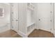 Well-organized mudroom with built-in storage and convenient access to the rest of the home at 1005 Coleman Place Dr, Roswell, GA 30075