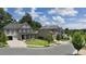 A beautiful street view showcasing well-maintained homes with manicured lawns and mature trees at 1005 Coleman Place Dr, Roswell, GA 30075