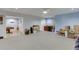 Large basement area showcasing a game room, bar, and ample storage space at 2365 Valley Mill Dr, Buford, GA 30519