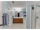 Bright bathroom featuring a double vanity, separate shower, and soaking tub at 2365 Valley Mill Dr, Buford, GA 30519