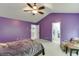 Vaulted bedroom with ceiling fan and ensuite bathroom access at 2365 Valley Mill Dr, Buford, GA 30519