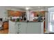 Kitchen features a breakfast bar, wood cabinets, and ample counter space at 2365 Valley Mill Dr, Buford, GA 30519