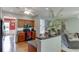 Kitchen with stainless appliances, wood cabinets and a breakfast bar at 2365 Valley Mill Dr, Buford, GA 30519