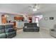 Spacious living room with open layout to the kitchen and dining area, featuring comfortable seating at 2365 Valley Mill Dr, Buford, GA 30519