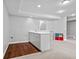 Finished basement featuring a stylish wet bar with sleek countertops and ample cabinet space at 4004 Charrwood Trce, Marietta, GA 30062