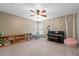 Comfortable bedroom featuring a ceiling fan, mural, and bright decor at 4004 Charrwood Trce, Marietta, GA 30062
