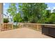 Wooden deck overlooking the backyard, complete with a grill and plenty of space for relaxing at 4004 Charrwood Trce, Marietta, GA 30062