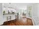 Modern kitchen with white cabinets, stainless steel appliances, and open layout at 4004 Charrwood Trce, Marietta, GA 30062
