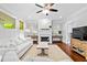 Cozy living room featuring a fireplace, comfortable seating, and stylish decor at 4004 Charrwood Trce, Marietta, GA 30062