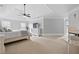 Spacious main bedroom boasts a tray ceiling, ceiling fan, fireplace and ensuite bath at 4004 Charrwood Trce, Marietta, GA 30062