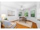 Bright office space with a ceiling fan, natural light, and light wood floors, great for working from home at 1920 Jett Ridge Rd, Cumming, GA 30041