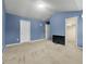 Spacious bedroom with vaulted ceilings, neutral carpet, and ample closet space at 3379 Thornbridge Dr, Powder Springs, GA 30127