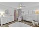 Bright Bedroom with white crib, dresser, and rocking chair at 4779 Bogan Meadows Dr, Buford, GA 30519