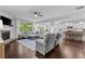 Spacious living room with a fireplace and plenty of seating at 4779 Bogan Meadows Dr, Buford, GA 30519