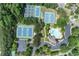 A community featuring tennis courts and a large pool with lounge chairs, ideal for relaxation and recreation at 1085 Highland Crest Ct, Mableton, GA 30126