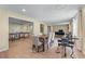 Finished basement with tile floors, a ping pong table, and a dining area at 1085 Highland Crest Ct, Mableton, GA 30126