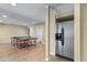 Recreational area in basement featuring a refrigerator and ping pong table at 1085 Highland Crest Ct, Mableton, GA 30126