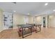 Finished basement features tile flooring, ping pong table, and built-in shelving at 1085 Highland Crest Ct, Mableton, GA 30126