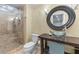 Updated bathroom with glass shower, vessel sink, and contemporary fixtures at 1085 Highland Crest Ct, Mableton, GA 30126