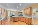 Spacious eat-in kitchen featuring granite countertops, stainless steel appliances, and hardwood floors at 1085 Highland Crest Ct, Mableton, GA 30126
