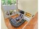 High-angle of living room with fireplace, built-ins, and hardwood floors at 1085 Highland Crest Ct, Mableton, GA 30126