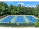 Well-maintained tennis courts with lighting, offering opportunities for active recreation in the community at 1085 Highland Crest Ct, Mableton, GA 30126