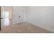 Carpeted bedroom with closet and white walls at 1624 Gunnin Nw Trce, Atlanta, GA 30318