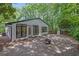 Charming home with a stone patio and lush greenery providing a private and serene outdoor retreat at 2858 Mornington Nw Dr, Atlanta, GA 30327
