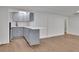Basement kitchenette with sleek cabinets, countertop, and modern sink offering convenience and style at 2858 Mornington Nw Dr, Atlanta, GA 30327