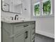 Stylish bathroom features an elegant vanity with marble countertop and plenty of storage at 2858 Mornington Nw Dr, Atlanta, GA 30327
