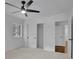 Bright bedroom featuring neutral carpet, windows, and closet at 2858 Mornington Nw Dr, Atlanta, GA 30327