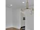 Dining room with modern light fixture and backyard views at 2858 Mornington Nw Dr, Atlanta, GA 30327
