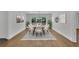Staged dining room with modern light fixture and backyard views at 2858 Mornington Nw Dr, Atlanta, GA 30327