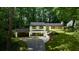 Charming two-story home with landscaped yard, dark trim, and attached garage at 2858 Mornington Nw Dr, Atlanta, GA 30327