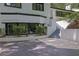 Inviting home entrance featuring a modern glass door with lush landscaping at 2858 Mornington Nw Dr, Atlanta, GA 30327