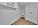 Functional laundry room featuring built-in shelving and a utility sink for efficient organization and cleaning at 2858 Mornington Nw Dr, Atlanta, GA 30327