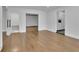 Spacious living room features hardwood floors and multiple entryways to other rooms in the home at 2858 Mornington Nw Dr, Atlanta, GA 30327