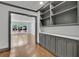 Spacious open-concept living area with hardwood floors, seamlessly connecting multiple rooms for modern living at 2858 Mornington Nw Dr, Atlanta, GA 30327