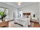 Inviting bedroom featuring hardwood floors, natural light, and neutral decor at 332 Shadowmoor Dr, Decatur, GA 30030