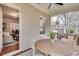 Cozy screened patio with brick accents and outdoor seating at 332 Shadowmoor Dr, Decatur, GA 30030
