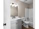 Bathroom features a new vanity with marble countertop, updated lighting, and shower-tub combo at 3589 Hopkins Ct, Powder Springs, GA 30127