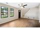 Comfortable living room featuring hardwood floors, stairs, and plenty of natural light at 3589 Hopkins Ct, Powder Springs, GA 30127