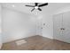 Neutral bedroom with hardwood floors, ceiling fan, and closet at 1643 Flintwood Se Dr, Atlanta, GA 30316