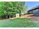 Spacious backyard with grassy lawn and storage shed at 2190 Ashley Crossing Ct, Lawrenceville, GA 30043