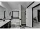Modern bathroom with a soaking tub, shower, sleek vanity, and updated finishes at 2190 Ashley Crossing Ct, Lawrenceville, GA 30043
