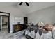 Comfortable bedroom featuring gray walls, a dresser, and a decorative sign at 2190 Ashley Crossing Ct, Lawrenceville, GA 30043
