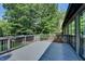 A spacious gray deck offers relaxing outdoor living at 2190 Ashley Crossing Ct, Lawrenceville, GA 30043