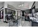 Modern kitchen with stainless steel appliances, granite counters, and a breakfast bar area at 2190 Ashley Crossing Ct, Lawrenceville, GA 30043