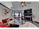 Open-concept living room showcasing a vaulted ceiling, stylish decor, fireplace, and comfortable seating at 2190 Ashley Crossing Ct, Lawrenceville, GA 30043
