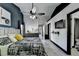 The primary bedroom features modern design, tray ceilings, ensuite access, and an accent wall at 2190 Ashley Crossing Ct, Lawrenceville, GA 30043